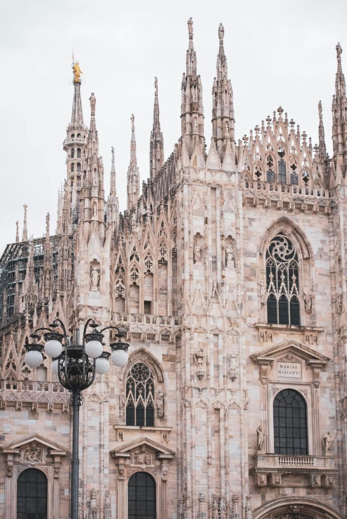 pexels photo 33006464 33006464 Stunning view of Milan Cathedral's gothic architecture capturing its intricate details.
