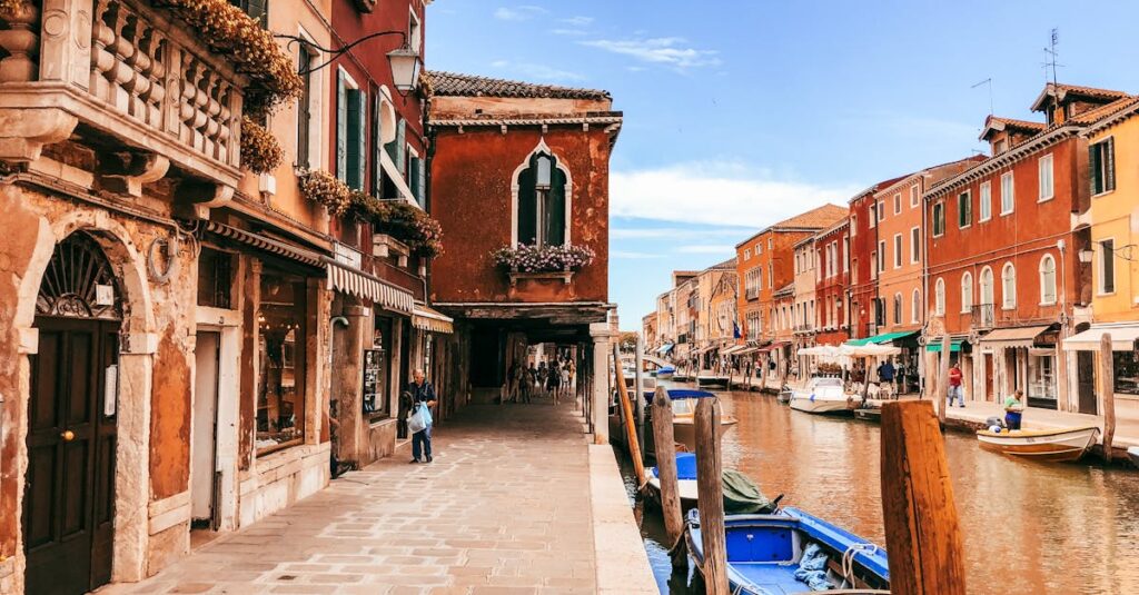 pexels photo 4968601 4968601 Explore the scenic canals of Venice with vibrant buildings and rich history.